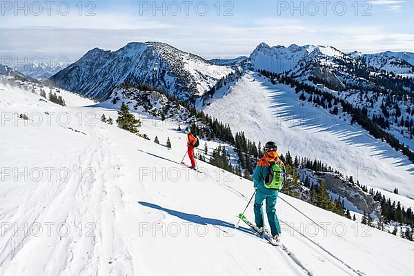 Two ski tourers, Taubenstein on the left