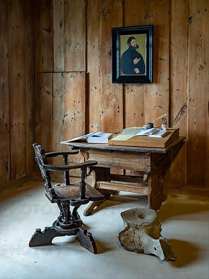 Table and chair, picture of Martin Luther as Junker Joerg