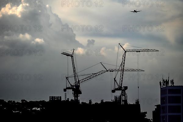 Symbolic image Climate change Aircraft, construction crane