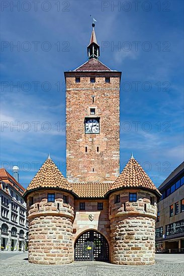 White tower with barbican, tower clock