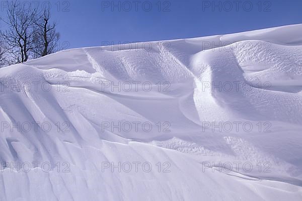 Winter snowdrift snowbank ridge after blizzard at Patricia Beach on Lake Winnipeg Manitoba Canada,