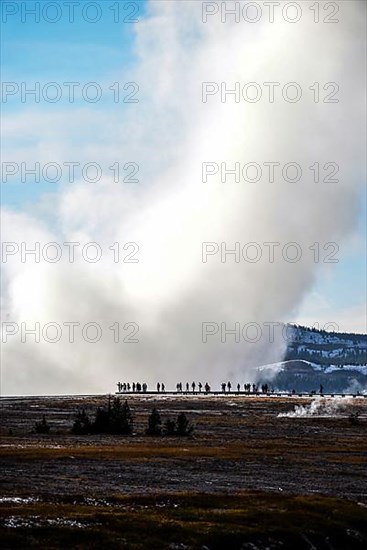 Visitors among fumaroles in Upper Geyser Basin, Yellowstone National Park