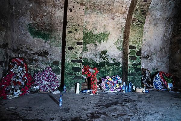 Commemoration, paper and plastic flower arrangements