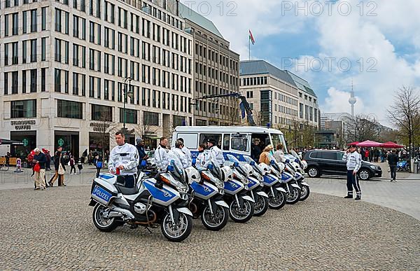 Berlin police motorbike squad stands in front of the Brandenburg Gate, Berlin