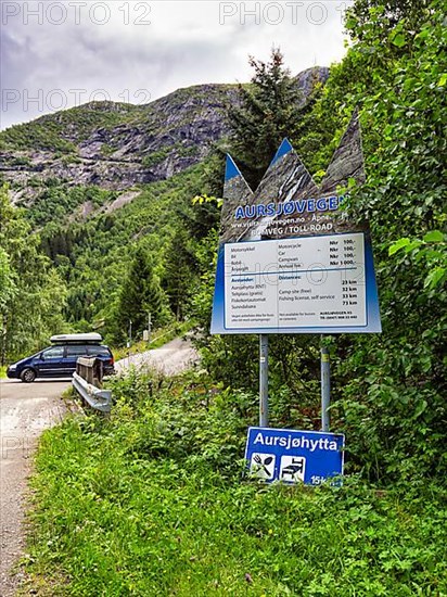 Access to the toll road with information board, price board