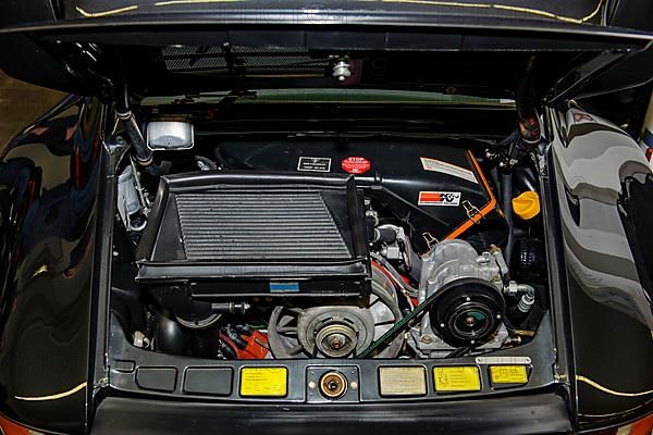 View under bonnet with engine Turbo engine of Porsche 911 930 Turbo Targa, Techno Classica trade fair