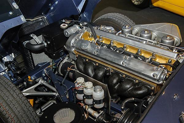 View under bonnet of historic classic racing car sports car classic car Jaguar E-Type Series 1 Roadster with engine 3-8-litre flat floor 6-cylinder, 60s 1961