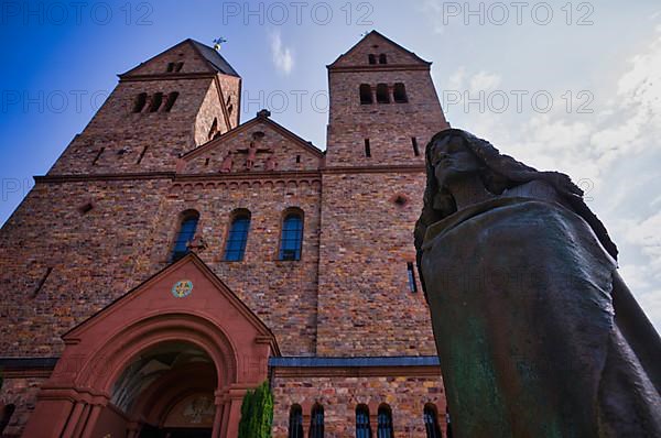 Statue of Saint Hildegard of Bingen in front of the abbey church, St. Hildegard Abbey