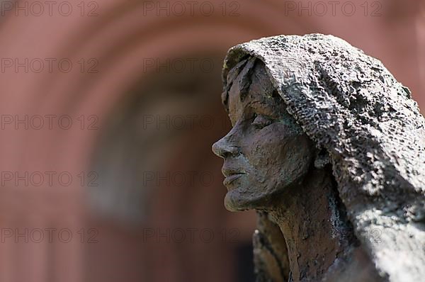 Statue of Saint Hildegard of Bingen in front of the abbey church, St. Hildegard Abbey