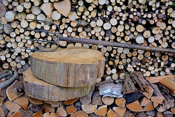 Firewood store with pitchfork