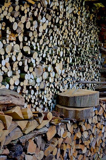 Firewood store with pitchfork
