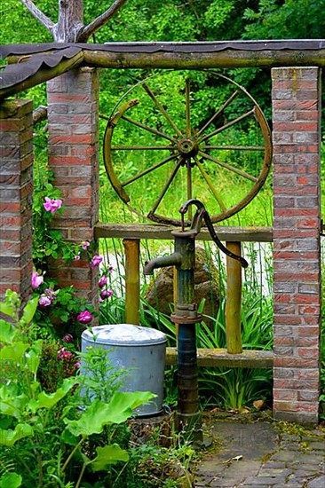 Old wagon wheel at the fountain