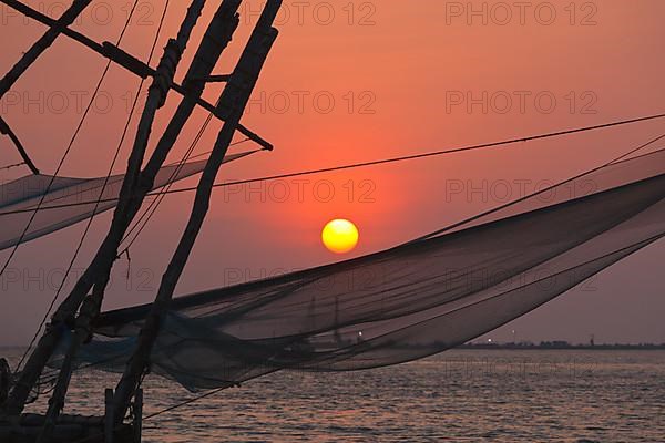 Kochi chinese fishnets on sunset. Fort Kochin