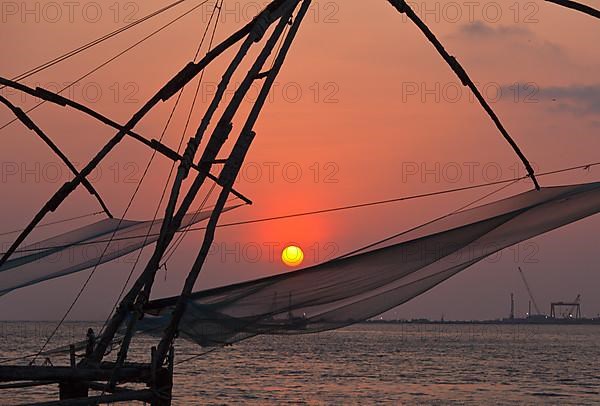 Kochi chinese fishnets on sunset. Fort Kochin