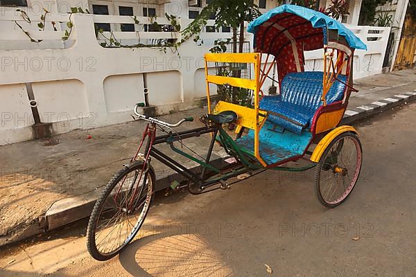 Empty bicycle rickshaw in street. Pondicherry