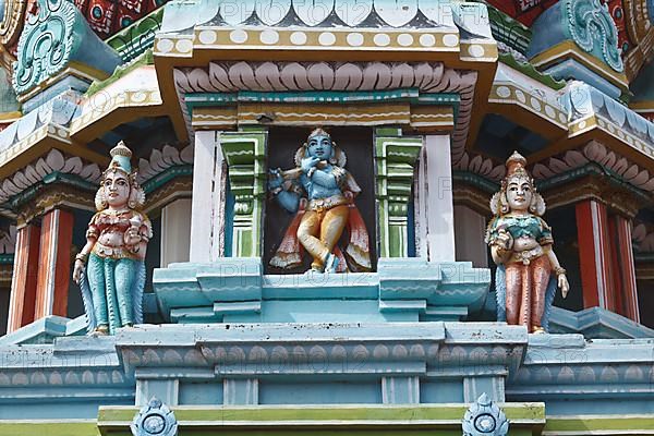 Krishna image. Sculptures on Hindu temple gopura