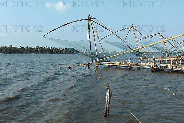 Kochi chinese fishnets on sunset. Fort Kochin