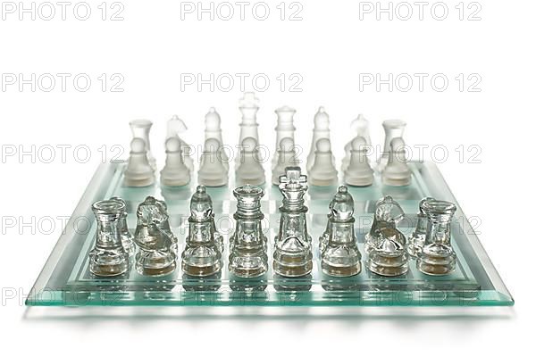 Glass chess on chess board