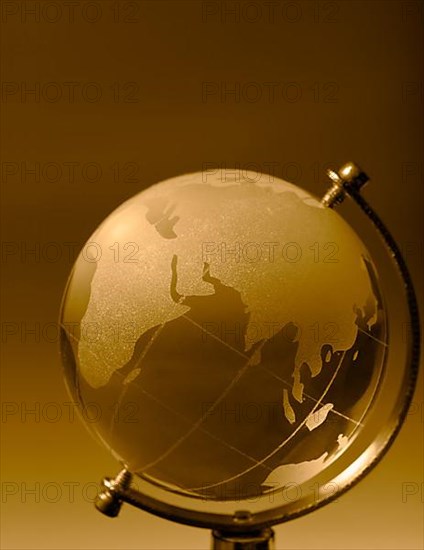 Crystal glass globe orange tinted