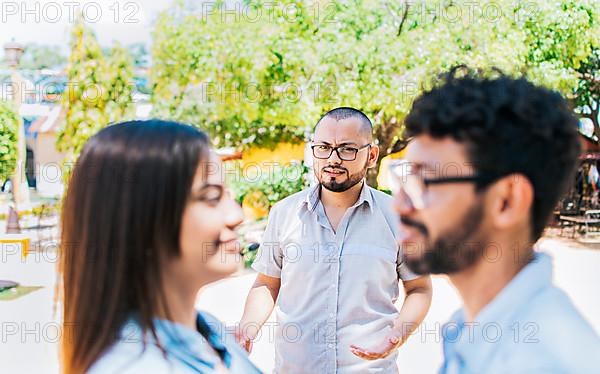 Man discovering his cheating girlfriend with another man outdoor