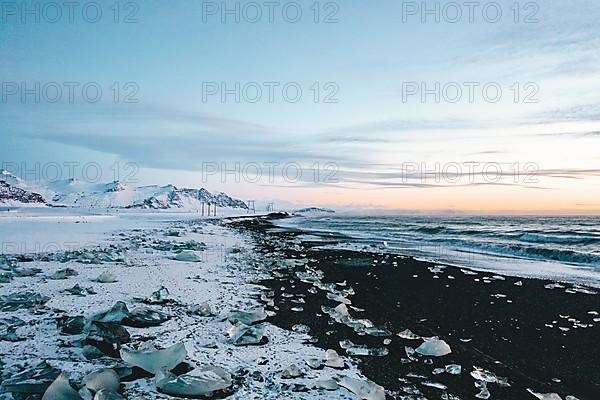 View over Diamond Beach in Iceland with Ice Cubes on the ground HQ