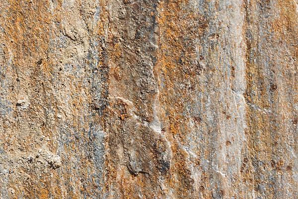 Stone texture background natural rock texture Abstract background and texture for designers Close up of stone surface background surface of the stone with brown tint