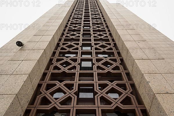 The wall of the building is lined with granite marble slabs