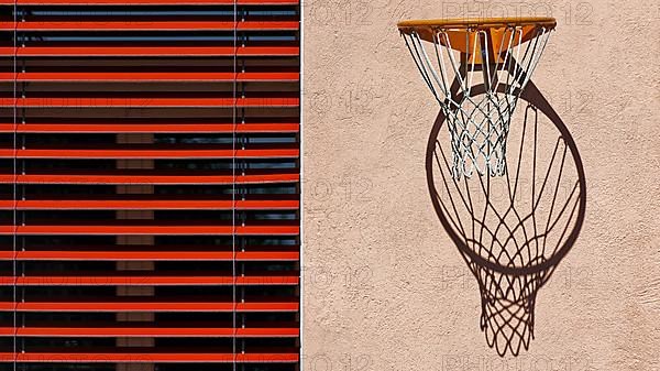 Basketball hoop with long shadow