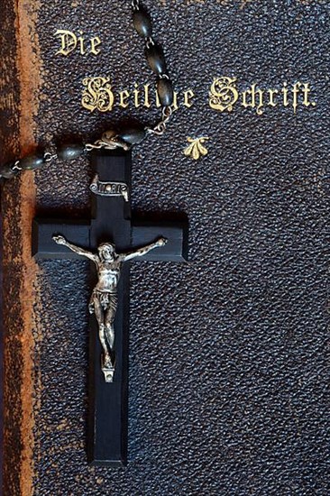 Crucifix on Bible