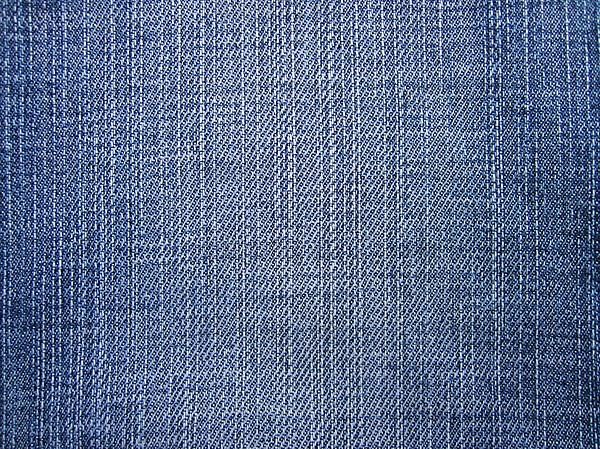 Denim jeans as blue background. Shown in full image in the layer