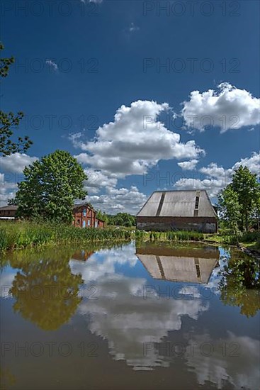 Pond with former stables from the Othenstorf estate