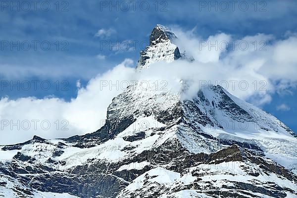 The Matterhorn with an impressive cloud plume. Zermatt