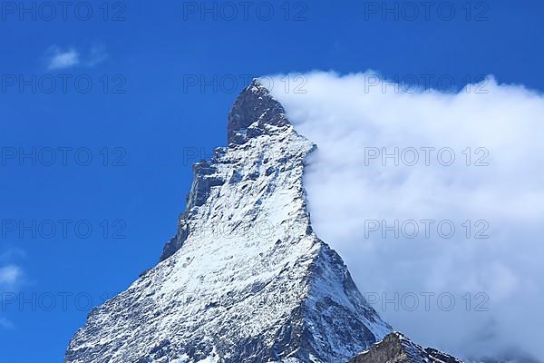 The Matterhorn with an impressive cloud plume. Zermatt