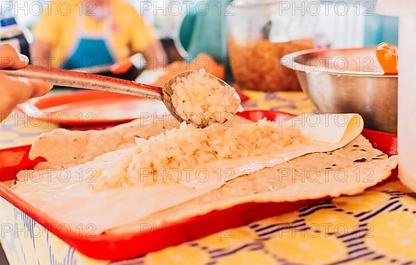 View of the traditional Quesillo with pickled onion