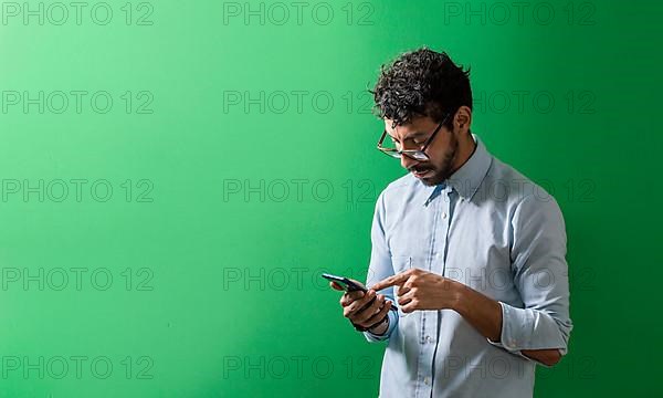 Isolated person checking his cell phone