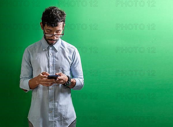 View of handsome man using cell phone isolated