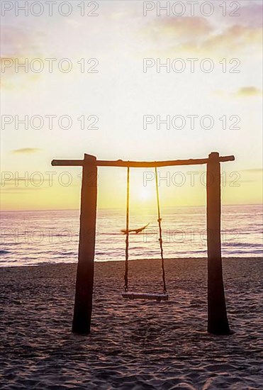 Swing beach sunrise