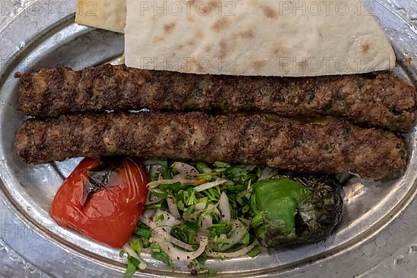 Serving of traditional urfa kebab in Gaziantep