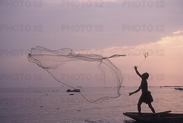 Fishing against Sun rise