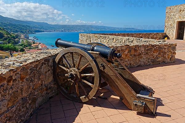 Old cannon on the castle and museum Castello Murat with sea view