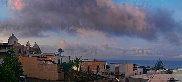 San Vincenzo island village and Stromboli volcano at sunset