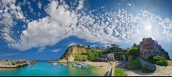 Panorama of the small bay and beach of Pizzo below the church Chiesa del Carmine with small fishing boats under bizarre cloudy sky