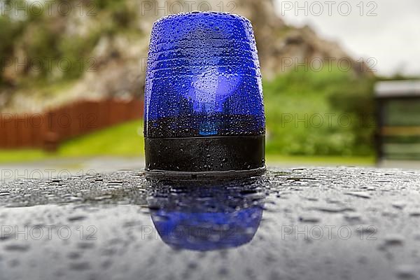 Blue light on a car roof