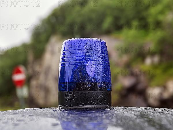 Blue light on a car roof