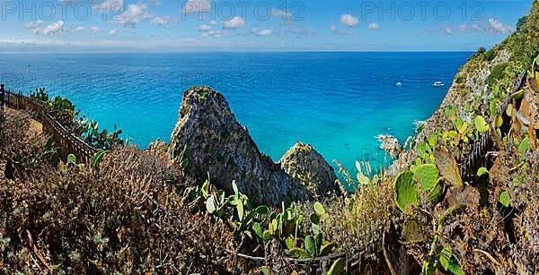 View of the rocks of Capo Vaticano with turquoise sea