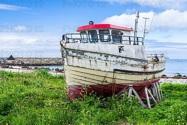 Old fishing boat on beach of Bleik