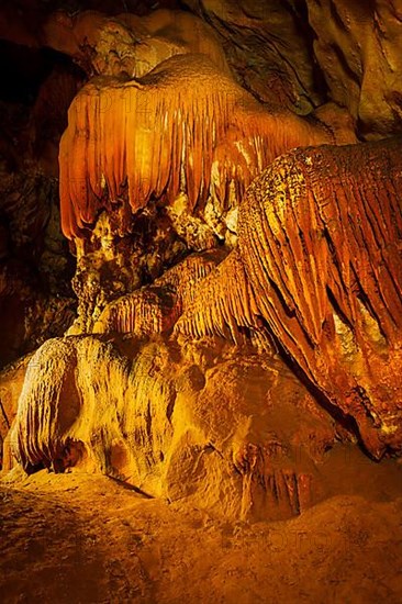 Stalactite rock formations in cave. Chiang Dao