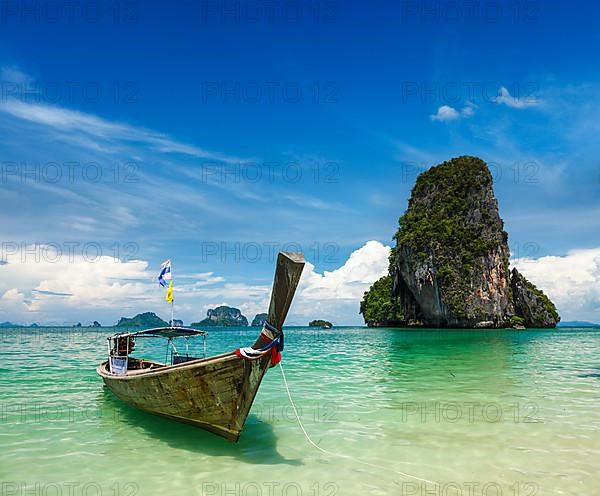 Long tail boat on tropical beach