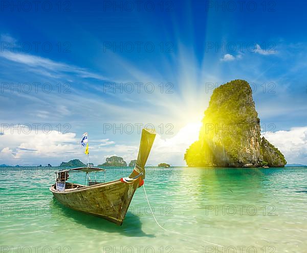 Long tail boat on tropical beach