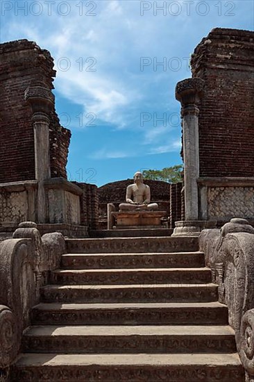 Ancient sitting Buddha image in votadage. Pollonaruwa